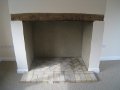 Original fireplace with Bressumer and new hearth, using bricks re-claimed from under the kitchen floor